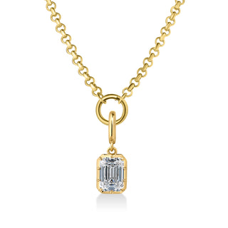 About: A refined take on a classic silhouette, this necklace features a emerald cut shape stone suspended from a polished gold rolo chain. Timeless and modern, it adds an elevated finish to everyday styling.

Diamond Details: Emerald Cut Lab Grown Diamond

Total Carat Weight: Available in 2 or 3 Carats
Color:&nbsp;E/F
Clarity:&nbsp;VS

Metal:&nbsp;14K Solid Gold

Available in 14K Yellow Gold, 14K White Gold, Two-tone (14K White Gold Front + 14K Yellow Gold Back + Bail), Two-tone (Black Rhodium Front + 14K Y