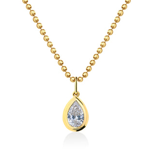 About: This pear pendant necklace features a bezel set stone on a polished gold ball chain, offering a clean take on a classic shape. Thoughtfully designed and easy to wear, it adds a refined touch to everyday styling.

Diamond Details: Lab Grown Diamond

Total Carat Weight:&nbsp;1 Carat

Color:&nbsp;E/F
Clarity:&nbsp;VS

Metal:&nbsp;14K Gold&nbsp;

Available in 14K Yellow Gold or 14K White Gold

Chain Dimensions:

Length: Adjustable 16-18"&nbsp;
Width: 1.5 mm Ball Chain

Pendant Dimensions: Approx 12.7 mm 