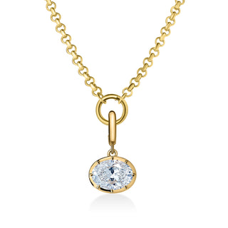 About: A refined take on a classic silhouette, this necklace features a east west oval shape stone suspended from a polished gold rolo chain. Timeless and modern, it adds an elevated finish to everyday styling.

Diamond Details: East West Oval Lab Grown Diamond

Total Carat Weight: Available in 2 or 3 Carats
Color:&nbsp;E/F
Clarity:&nbsp;VS

Metal:&nbsp;14K Solid Gold

Available in 14K Yellow Gold, 14K White Gold, Two-tone (14K White Gold Front + 14K Yellow Gold Back + Bail), Two-tone (Black Rhodium Front +