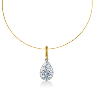 About: A timeless pear-shaped diamond pendant with a refined mixed-metal look, designed to feel both classic and modern.&nbsp;Suspended from a refined gold chain, it is designed to feel clean, elevated, and distinctly your own.

Diamond Details: Lab Grown Diamond

Total Carat Weight: Available in 2 or 3 carats
Lab Diamond Color: E/F
Lab Diamond Clarity: VS

Metal: 14K Solid Gold

Pendant available in 14K Solid Yellow Gold, Two-tone (14K Solid White Gold Front + 14K Solid Yellow Gold Back + Bail), Two-tone (