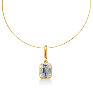 About: A timeless emerald cut diamond pendant with a refined mixed-metal look, designed to feel both classic and modern. Suspended from a refined gold omega chain, it is designed to feel clean, elevated, and distinctly your own.

Diamond Details: Emerald Cut&nbsp;Lab Grown Diamond

Total Carat Weight: Available in 2 or 3 carats
Lab Diamond Color: E/F
Lab Diamond Clarity: VS

Metal: 14K Solid Gold

Available in 14K Yellow Gold, 14K White Gold, Two-tone (14K White Gold Front + 14K Yellow Gold Back + Bail), Tw
