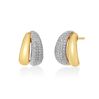 About: Polished gold and pavé diamond curves come together in a sculptural double-row silhouette. Bold yet easy to wear, these huggies bring dimension and modern sparkle to any ear stack.

Diamond Details: Pavé Natural&nbsp;Diamonds

Total Carat Weight: 0.36 Carats
Color:&nbsp;G/H
Clarity: SI

Metal: 14K Gold

Closure:&nbsp;Push Back

Sold as a pair.