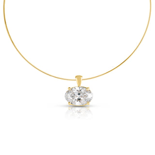 About: This oval diamond pendant necklace is available with your choice of a 2 or 3 carat lab grown diamond, offering a personalized approach to a classic setting. Suspended from a refined gold chain, it is designed to feel clean, elevated, and distinctly your own.

Diamond Details: Lab Grown Diamond

Total Carat Weight: Available in 2 or 3 carats
Lab Diamond Color: F
Lab Diamond Clarity: VS

Metal: 14K Yellow Gold

Length: Available in 12-14" or 14-16"

Closure: Lobster Clasp