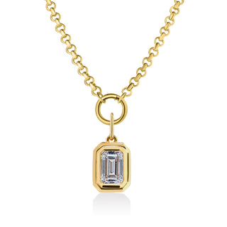 About:&nbsp;This emerald cut pendant necklace features a bezel set stone on a polished gold rolo chain, balancing clean structure with subtle dimension. Understated and polished, it is designed for everyday wear with an elevated feel.

Diamond Details:&nbsp;Lab Grown Diamond

Total Carat Weight:&nbsp;1 Carat

Color:&nbsp;E/F
Clarity:&nbsp;VS

Metal:&nbsp;14K Solid Gold

Available in&nbsp;14K Yellow Gold and 14K White Gold&nbsp;

Chain Dimension:&nbsp;

Length: 18"
Width:&nbsp;3.25 mm

Pendant Closure:&nbsp;