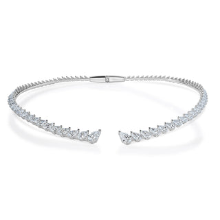 About: This pear shape diamond necklace is designed with a soft, graduated drape that follows the neckline beautifully. Refined yet eye catching, it makes a statement while still feeling polished and classic.


Diamond Details:&nbsp;Lab Grown Diamonds
Total Carat Weight:&nbsp;Approx 20 Carats
Color:&nbsp;E/F
Clarity:&nbsp;VS

Metal:&nbsp;14K White Gold

Closure: Hinge Closure