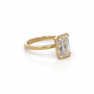 Half Bezel Emerald Cut Diamond Solitaire Ring