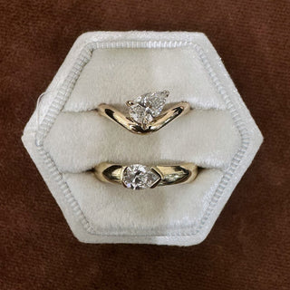 A sculptural ring with modern edge, this ring showcases a pear shape center stone set on a curved band for a look that feels both timeless and unexpected.

The elongated pear shaped diamond flatters the finger, while the sculptural curved band gives the design a clean, polished finish. Classic on its own and beautiful stacked with styles, this pinky ring offers a fresh take on a timeless solitaire.

Diamond Details: Pear Shape Lab Grown Diamond

Total Carat Weight: Approx 0.75 Carats
Color:&nbsp;F
Clarity:&