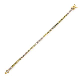 About: This gemstone tennis bracelet features a soft blend of green sapphires set in 14K gold. Fresh yet refined, it brings subtle color and pop of color to everyday stacks.

Stone Details: Natural Green Sapphires

Total Carat Weight: Approx&nbsp;8 Carats

Metal: 14K Gold&nbsp;


Width: Approx 3 mm

Length:&nbsp;Available in 6.5" or 7"

Closure: Box clasp with side safety