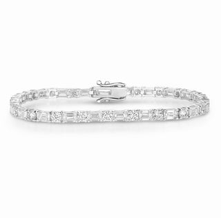 About: Alternating round and emerald cut stones give this tennis bracelet a balanced mix of softness and structure. Crafted in 14K gold, it offers a clean, elevated look with subtle dimension.

Diamond Details:&nbsp;Approx 45 Emerald and Round Cut Lab Grown Diamonds

Total Carat Weight:&nbsp;Approx 9 Carats (Each 0.15 Carats)
Color: E/F
Clarity:&nbsp;VS
Metal:&nbsp;14K Gold
Available in 14K Yellow Gold, and 14K White Gold
Length: Available in 6.5" or 7"



Closure:&nbsp;Under Locking Clasp