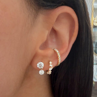 About: Round lab diamonds create a graduated drop silhouette with subtle movement and maximum sparkle. Refined yet eye-catching, these earrings offer a fresh take on the classic diamond stud.

Diamond Details: 4 Round Lab Diamonds

Total Carat Weight: 1.58 Carats
Color:&nbsp;E/F
Clarity: VS

Metal: 14K Gold

Dimensions: 5mm x 10.3mm

Closure:&nbsp;Push Back

Sold as a pair.