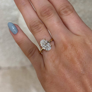 Oval Diamond Solitaire Engagement Ring With Hidden Halo