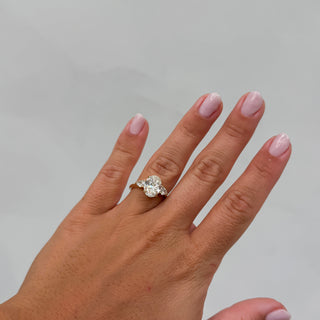 Oval Diamond Engagement Ring With Pear Side Stones