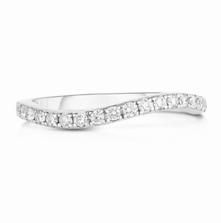 About: This curved band ring is set with round stones in 14K gold for a soft, flowing silhouette. Its gently sculpted shape makes it easy to stack, while still feeling polished on its own.

Diamond Details: 20 Round Natural Diamonds&nbsp;

Total Carat Weight: 0.40 Carats
Color: G/H
Clarity: SI

Metal: 14K Solid Gold&nbsp;

Available in 14k Yellow Gold, 14k White Gold, 14k Rose Gold

Band width: 1.77 mm