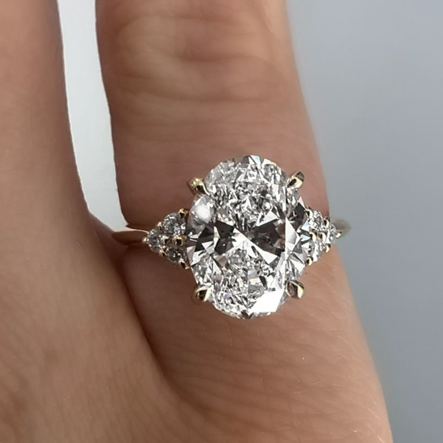 2.31 Oval Diamond Engagement Ring with Trio Side Stones