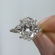 2.31 Oval Diamond Engagement Ring with Trio Side Stones
