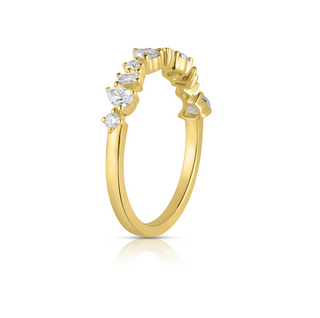 About:&nbsp;This band ring features a mix of pear, emerald, and round diamonds set in 14K gold for a look that feels collected and distinctive. The varied shapes create a balanced composition with a polished, modern feel.

Diamond Details: Mixed Shape Natural Diamonds

Total Carat Weight:&nbsp;0.47 Carats
Color:&nbsp;G/H
Clarity:&nbsp;SI

Metal:&nbsp;14K Solid Yellow Gold

Band width:&nbsp;1.65 mm