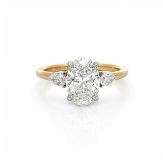 Oval Diamond Engagement Ring With Pear Side Stones
