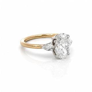Oval Diamond Engagement Ring With Pear Side Stones