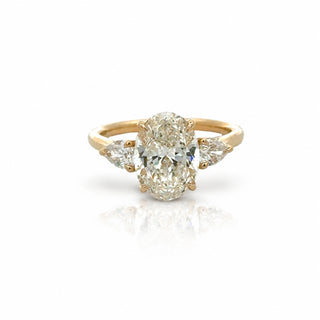 Oval Diamond Engagement Ring With Pear Side Stones