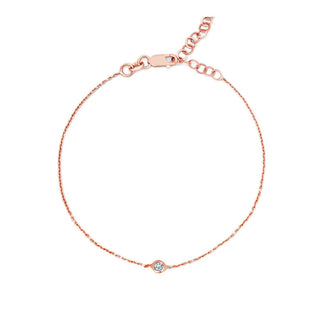 About: A single bezel set diamond gives this delicate bracelet a clean, understated focal point. Crafted in 14K gold, it layers effortlessly and adds a subtle finish to everyday wear.

Diamond Details: 1 Round Natural Diamond&nbsp;

Total Carat Weight: 0.05 Carats
Color: G/H
Clarity: SI
Metal:&nbsp;14K Solid Gold&nbsp;
&nbsp;
Width:&nbsp;2 mm&nbsp;


Length:&nbsp;Adjustable 6.5-7"


Closure:&nbsp;Lobster clasp