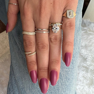 About: A modern twist on the classic pavé band, this ring features rows of round diamonds set along a softly crossed yellow gold silhouette. The fluid, sculptural shape gives it added dimension, while the allover sparkle keeps it timeless and elevated.

Diamond Details:&nbsp;Pavé Natural Diamonds


Total Carat Weight: 0.42 Carats
Color:&nbsp;G/H&nbsp;
Clarity: SI1

Metal: 14K Solid Gold

Available in 14K Yellow Gold, 14K White Gold, or 14K Rose Gold

Width: 3.4 mm