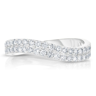 About: A modern twist on the classic pavé band, this ring features rows of round diamonds set along a softly crossed yellow gold silhouette. The fluid, sculptural shape gives it added dimension, while the allover sparkle keeps it timeless and elevated.

Diamond Details:&nbsp;Pavé Natural Diamonds


Total Carat Weight: 0.42 Carats
Color:&nbsp;G/H&nbsp;
Clarity: SI1

Metal: 14K Solid Gold

Available in 14K Yellow Gold, 14K White Gold, or 14K Rose Gold

Width: 3.4 mm